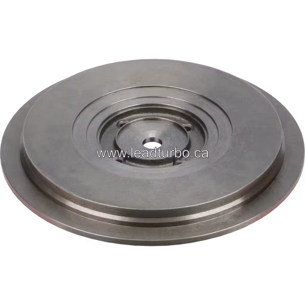 Cummins QSK50 turbo back plate top view with machined concentric grooves