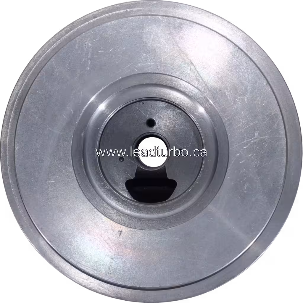 Front view of FOR 4038613 BH HX55 turbocharger bearing housing with machined outer rim