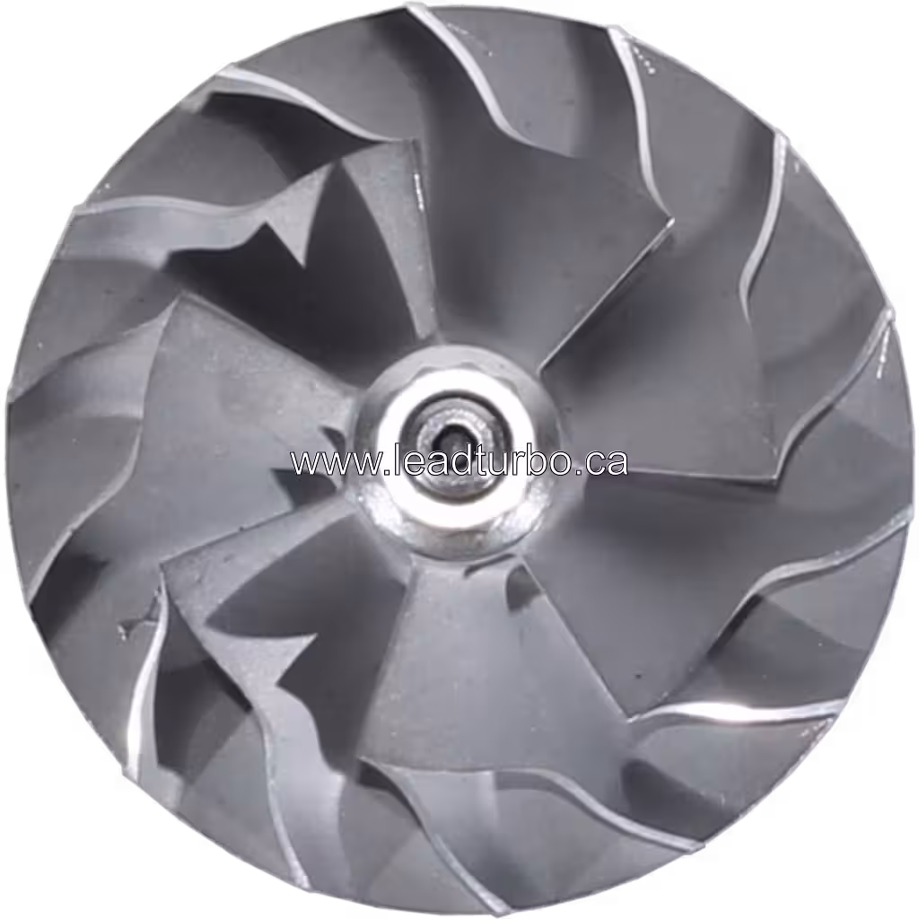 Top view of J96 turbocharger rotor assembly with shaft and bearing rings