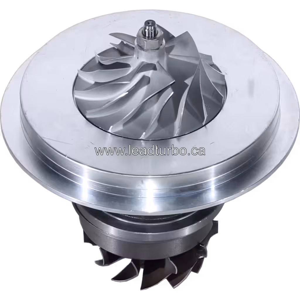 Top view of Komatsu SA6D140E-2A turbo core showing turbine wheel and housing