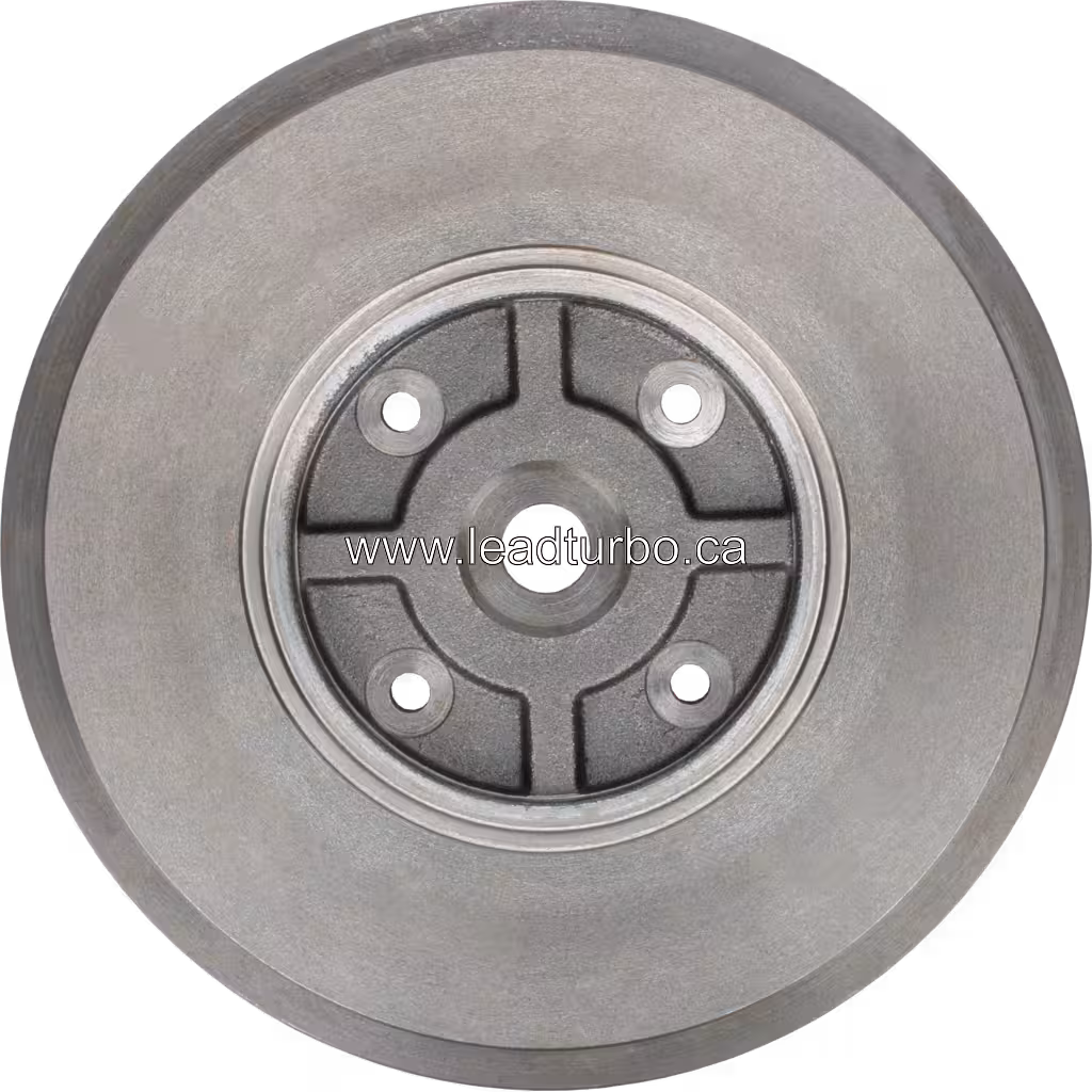 Composant métallique circulaire de turbocompresseur avec bossage central usiné