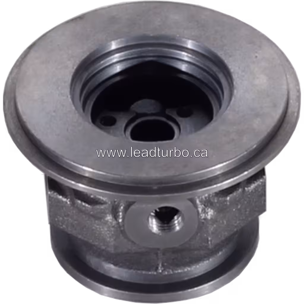 Vue supérieure du bearing housing J96 montrant l'ouverture centrale et un port fileté