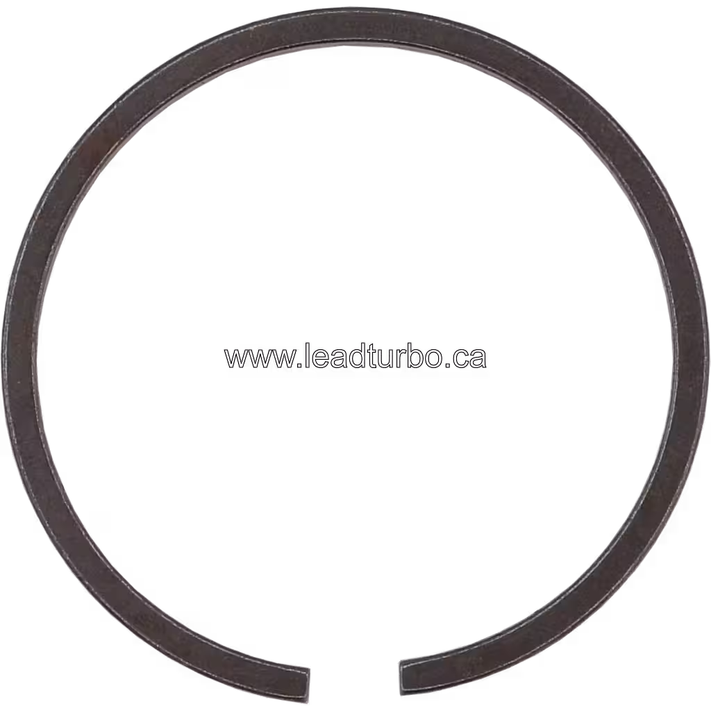 Vue de dessus d'un piston ring circulaire fendu avec finition métallique gris foncé