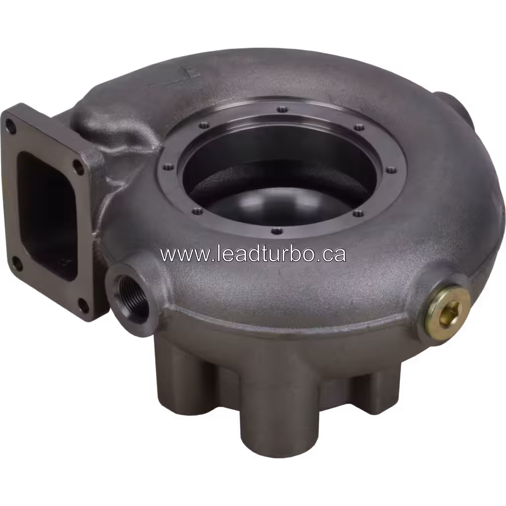 2843504 HX80M turbine housing bottom view showing brass-colored threaded fittings and mounting bosses