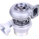 TV8112 turbocharger bottom view showing turbine wheel and V-band clamps