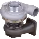 Top view of Komatsu SAA6D125E-5 turbocharger showing compressor inlet and turbine housing