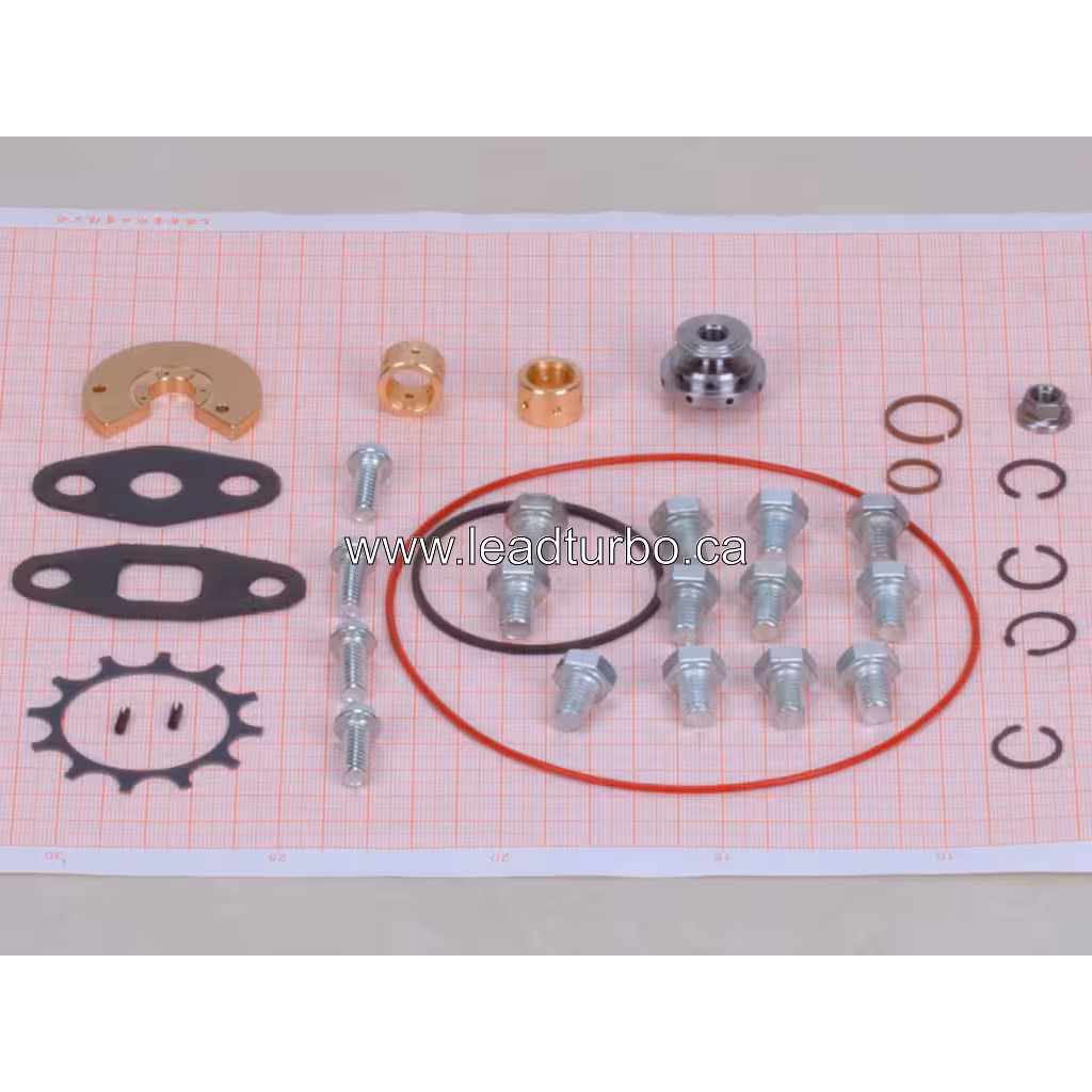 468265-0000 T04E17 turbo repair kit contents with bolts, gaskets, and bearing housing