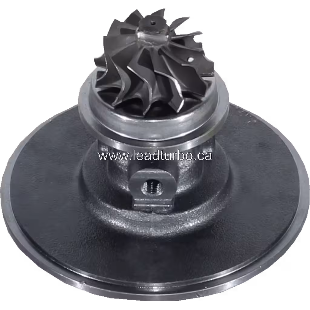 Bottom view of 24100-1541A turbo core showing turbine wheel and mounting holes